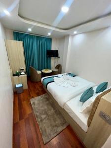 Katil atau katil-katil dalam bilik di Hotel Yuvan