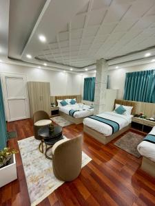 Katil atau katil-katil dalam bilik di Hotel Yuvan