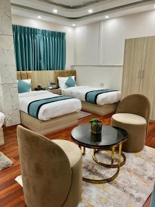 Katil atau katil-katil dalam bilik di Hotel Yuvan