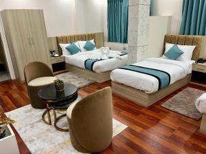 Katil atau katil-katil dalam bilik di Hotel Yuvan