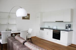 Kuchyň nebo kuchyňský kout v ubytování Seeappartements Villa Sole