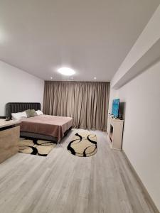 Ένα ή περισσότερα κρεβάτια σε δωμάτιο στο Rin grand 1 room luxury +7 φωτογραφίες