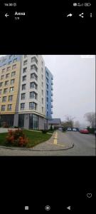 a large building on the side of a road at СТРИЙСЬКА,Автовокзал ,СИХІВ ARENA KING KROS Карла Мікльоша in Lviv