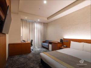 Roynet Hotel Seoul Mapoにあるベッド