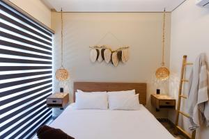 Giường trong phòng chung tại Tulum Escape - Private Hot Tub, Steps to Free Beach +89 ảnh