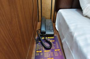 Postel nebo postele na pokoji v ubytování Radhika Resorts