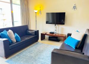 TV a/nebo společenská místnost v ubytování Outstanding Condo- Beach, Pool & Golf by BeCherish + 29 fotografií