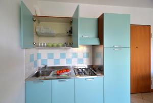 Η κουζίνα ή μικρή κουζίνα στο Residence Pineta Verde +25 φωτογραφίες