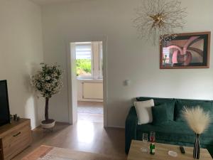 Posezení v ubytování Wohnung im Grünen