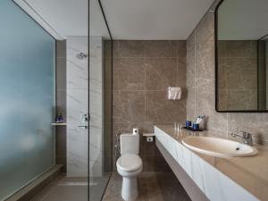 Un baño de Aston Inn Lumajang - East Java