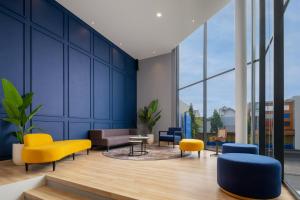 Zona de estar de Aston Inn Lumajang - East Java