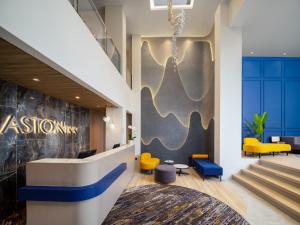 Zona de estar de Aston Inn Lumajang - East Java