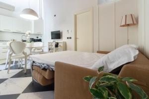 Kuchyň nebo kuchyňský kout v ubytování TEATRUM LOFT Teatro Galli -Jacuzzi in camera + 26 fotografií