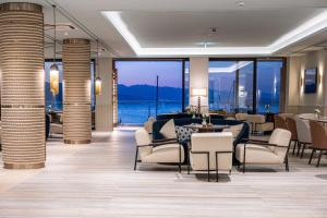 a hotel lobby with a view of the ocean at Amadria Park Grand Hotel 4 Opatijska Cvijeta in Opatija