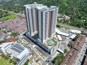 an overhead view of a tall building in a city at Family Suites Netflix House Aston Acacia Bukit Mertajam in Bukit Mertajam