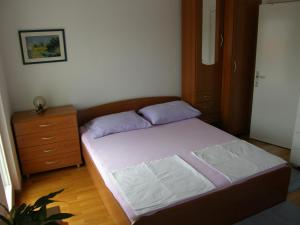 Posteľ alebo postele v izbe v ubytovaní Apartments Jakova Dudana 10