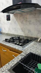 Køkken eller tekøkken på Delight 1 Bedroom Apartment + 8 billeder