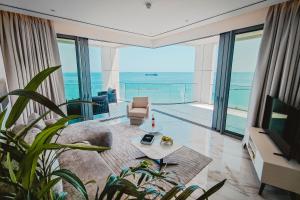 a living room with a view of the ocean at 2 Bed with Sea Views in Trilogy, Limassol Seafront in Limassol