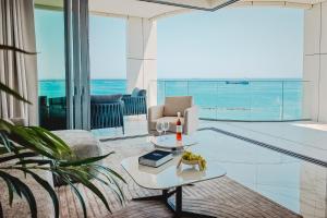a living room with a view of the ocean at 2 Bed with Sea Views in Trilogy, Limassol Seafront in Limassol