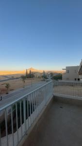 a view of the desert from the balcony of a building at שמיים in Mitzpe Ramon