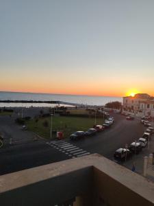 a sunset from the balcony of a condo at Tramonti sul mare in Marina di Pisa