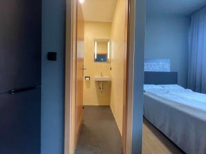 Letto o letti in una camera di M-Studios in Stuttgart Zentrum
