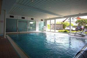 Bazén v ubytování Sinfonie nebo v jeho okolí