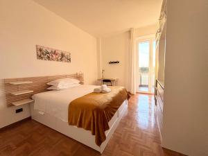 Postel nebo postele na pokoji v ubytování Bellavista Apartment Arcore