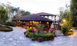 Vrt pred nastanitvijo Banbas Resort, Chitwan