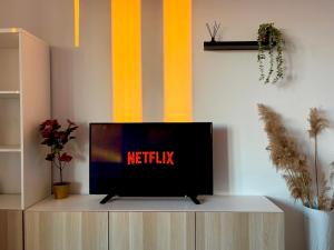 TV a/nebo společenská místnost v ubytování Bellavista Apartment Arcore