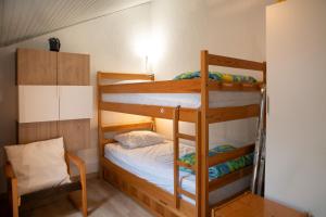 Ένα ή περισσότερα κρεβάτια σε δωμάτιο στο Cosy Studio Mezzanine