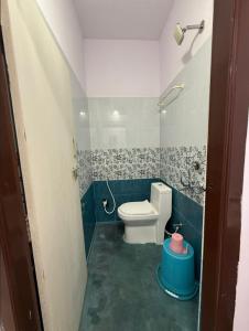 Ένα μπάνιο στο Hotel Udaan Villa