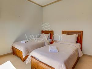 Ένα ή περισσότερα κρεβάτια σε δωμάτιο στο Heaven Bay - Luxe - Piscine - 4 or 5 Px