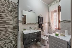 Ένα μπάνιο στο Bacicagiuba Apartments