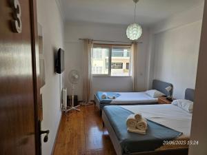 Ένα ή περισσότερα κρεβάτια σε δωμάτιο στο Blife Candya private apartment