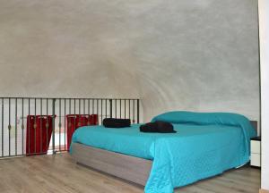 Ένα ή περισσότερα κρεβάτια σε δωμάτιο στο Cialdini di Mare