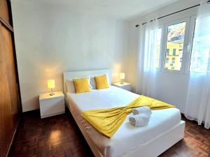 Ένα ή περισσότερα κρεβάτια σε δωμάτιο στο Villa Herédia