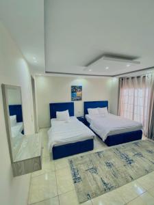 Postel nebo postele na pokoji v ubytování Noya Pyramids Inn + 46 fotografií