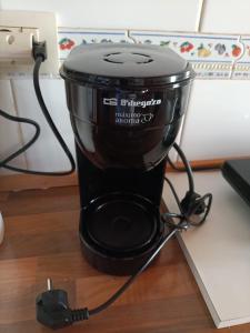 a black blender sitting on top of a table at La Cabaña de Morgan, Refugio con alma en el corazón de Galicia in Arnoia +37 photos