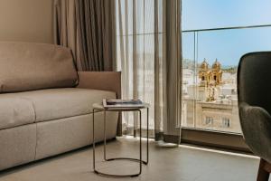 Χώρος καθιστικού στο Regional Hotel by NEU Collective