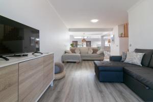 TV a/nebo společenská místnost v ubytování Casa Azeitao