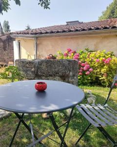 a table with a lady bug sitting on top of it at Chez Agatha in Vertheuil-en-Médoc