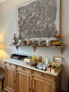 a kitchen with a counter with food on it at Bucciali in Boulogne-sur-Mer