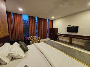 TV a/nebo společenská místnost v ubytování Hotel Best Inn ITER