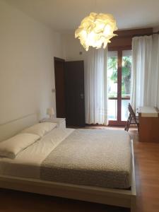 Postel nebo postele na pokoji v ubytování Hotel Moreri