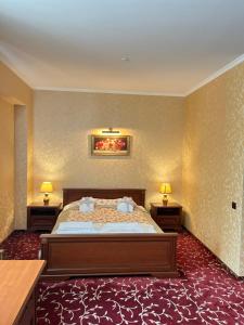 Postel nebo postele na pokoji v ubytování Shato Paradis Hotel