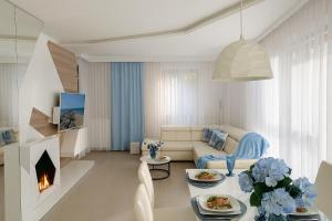 Χώρος καθιστικού στο Blue Seaside Apartment