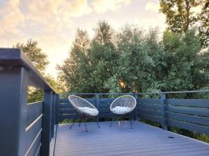 Balkón nebo terasa v ubytování Prima Resort Boddenblick - Camping-Stellplätze - Tiny Houses & Ferienwohnungen in Ostsee Nähe
