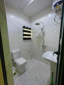Koupelna v ubytování Dearest service apartment