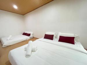 Ένα ή περισσότερα κρεβάτια σε δωμάτιο στο Life Art Home Family Ipoh Homestay 5R4B 18pax SY28